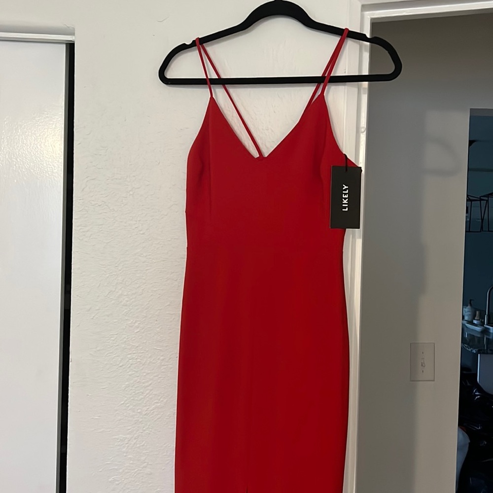 Likely red Gown with front slit❣️